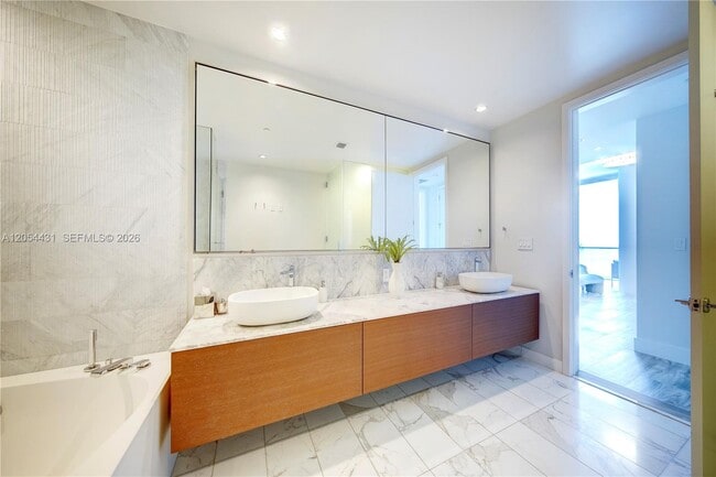 Building Photo - 10203 Collins Ave