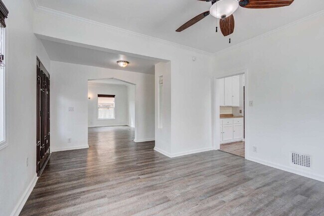 Building Photo - Stylishly Renovated Retro Duplex in the He...