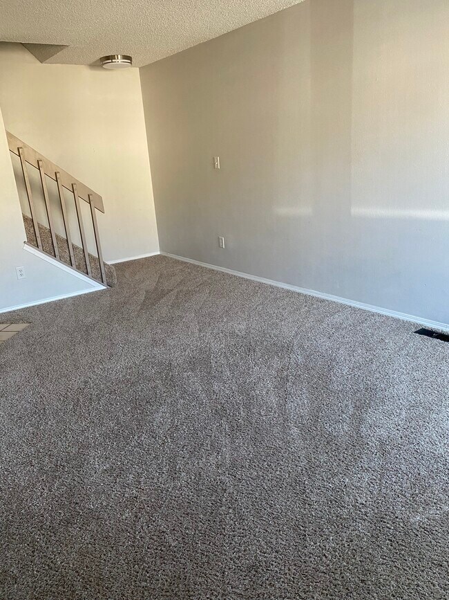 Living room with a gas fireplace - 2370 Lexington Village Ln