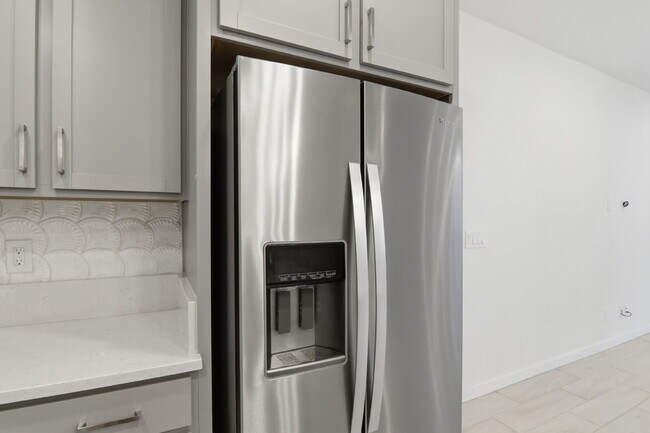 Building Photo - Experience refined living in this beautifully appointed 3-bedroom, 2.5-bathroom townhome spanning...