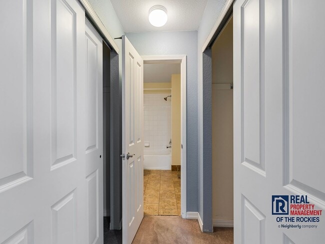 Building Photo - Fort Collins Townhouse with Vaulted Ceilin...