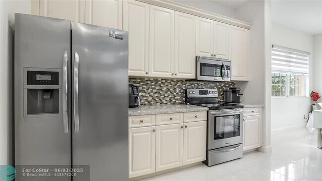 Building Photo - 7989 NW 128th Ln