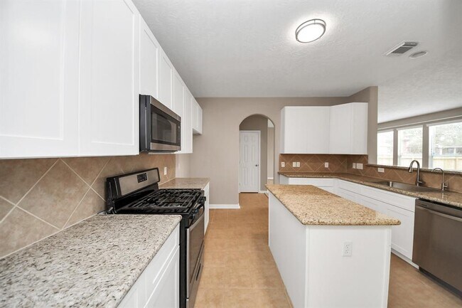 Building Photo - 7447 Oakwood Canyon Dr