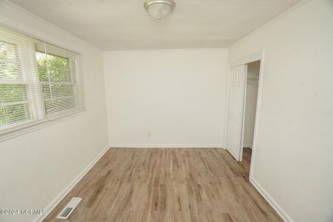 Building Photo - Lawn Care Included in Jville City Limits!