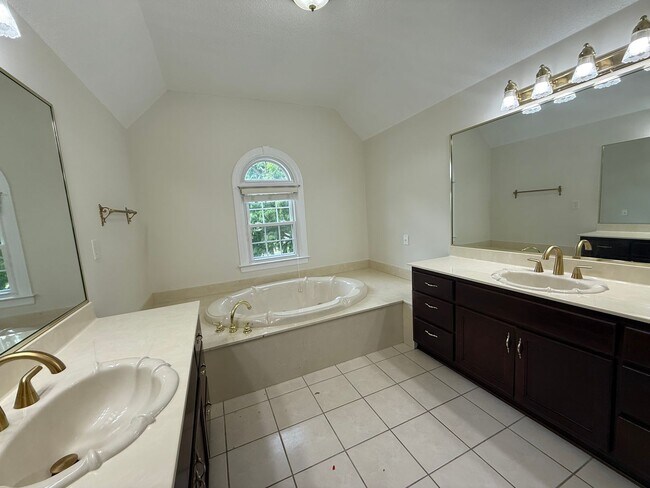 Building Photo - Spacious 5-Bedroom Home on a Corner Lot in...