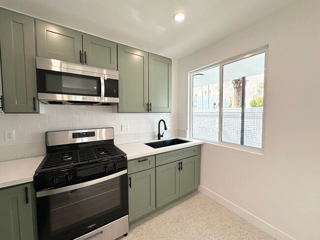 Building Photo - AVAILABLE NOW! Stunning Remodeled Studio 1...
