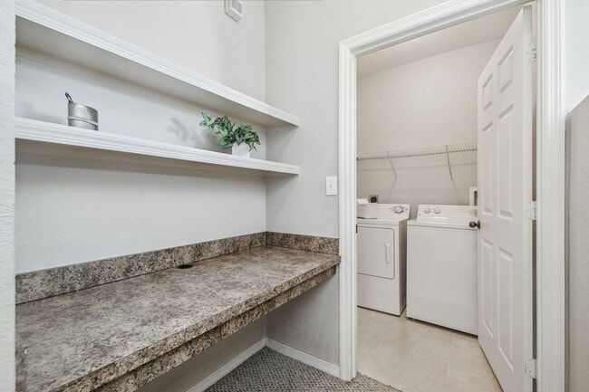 Building Photo - Elegant 1-Bedroom Condo with Lakeside Views in Resort-Style Community