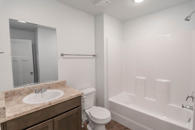 Building Photo - Up to one month free! 1-Bedroom Condos at ...