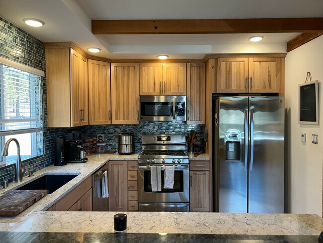 Building Photo - Upscale Chalet with 2 Car Garage Backing t...