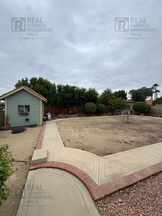 Building Photo - Corner-Lot Charmer with Open Layout and Sp...