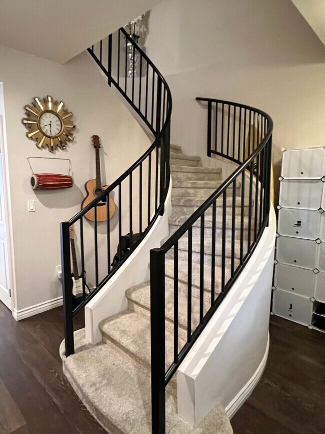 Stairs to go up to the second floor located in the family room - 89 E Commonwealth Ave