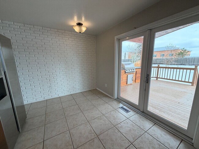 Building Photo - 4-Bed Home Near Clement Park with Entertainer’s Basement & Outdoor Oasis