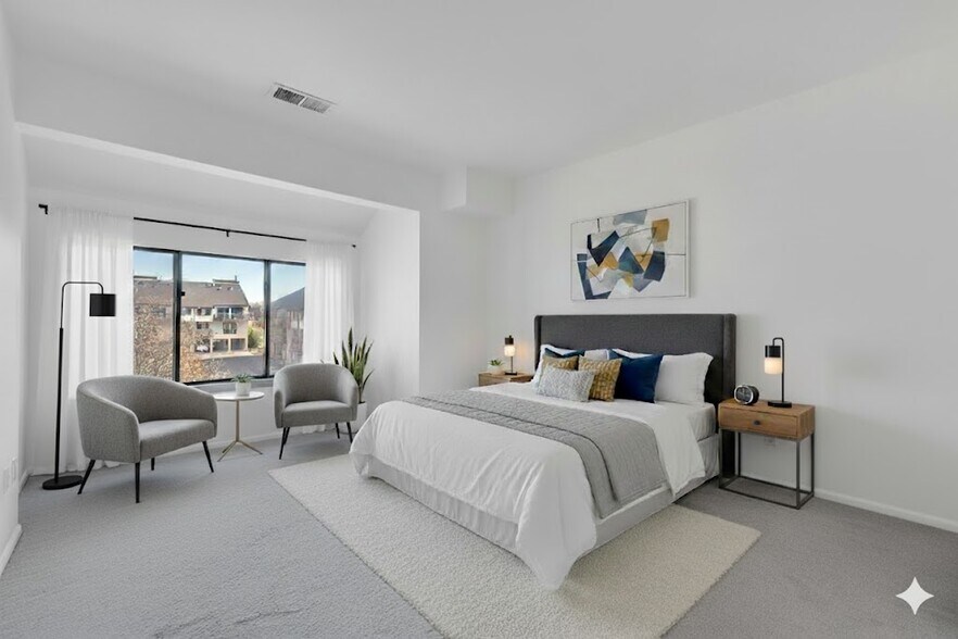 Cozy bedroom digitally staged to showcase space and design potential. - 3320 Richmond Ct