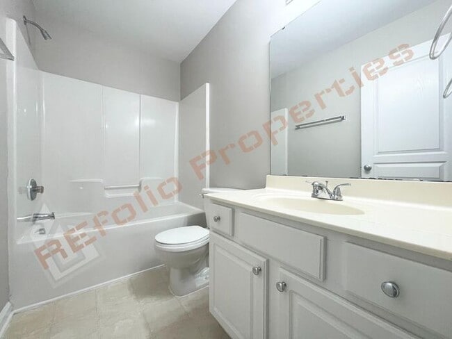 Building Photo - Fresh Paint Interior! Lovely 3 Bedroom 2.5...
