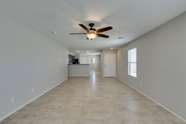 Building Photo - 2 bedroom + Den- Upgraded Flooring ready for immediate move in