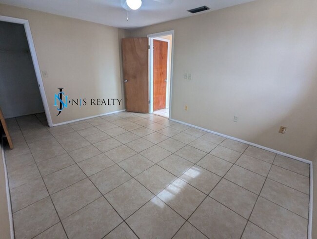 Building Photo - Section 8 available: 2/2 over 1048sf with ...