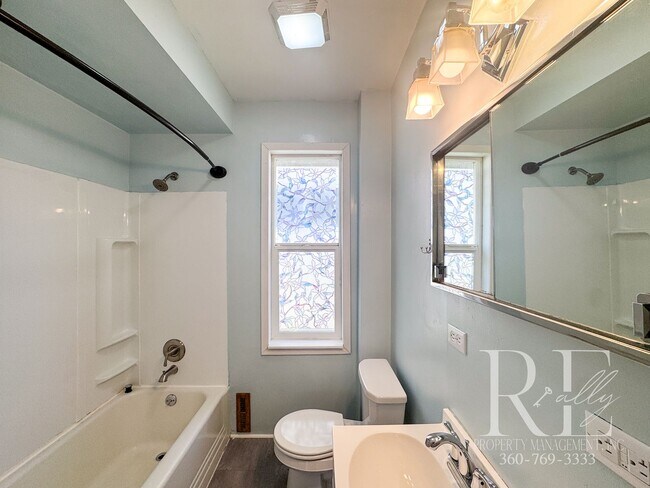 Building Photo - Light-Filled Home with Vaulted Ceilings, Bonus Basement & Walkable Location