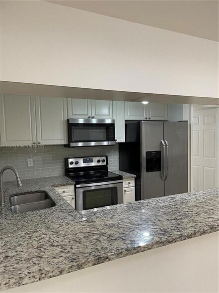 Building Photo - 6312 W Sample Rd