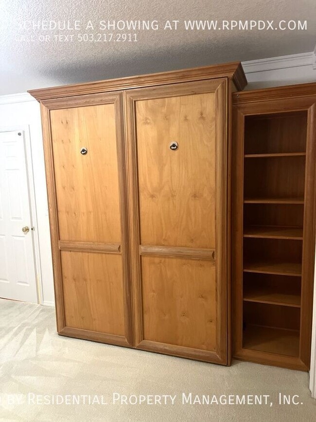 Building Photo - 6463 NW Wenmarie Dr