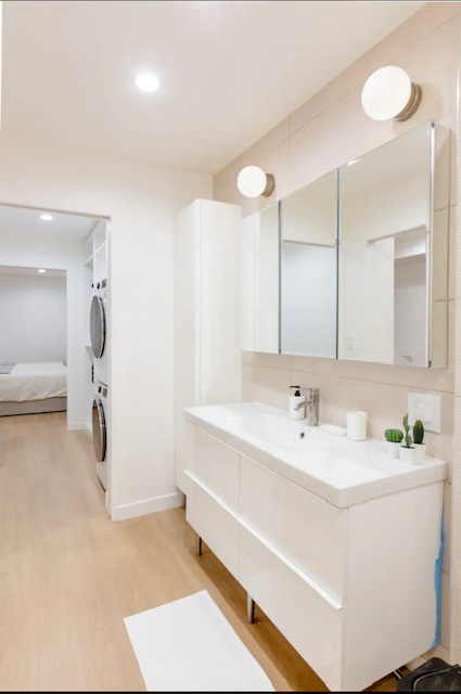 Bathroom facing closet and bedroom - 8535 Knoll N W Dr