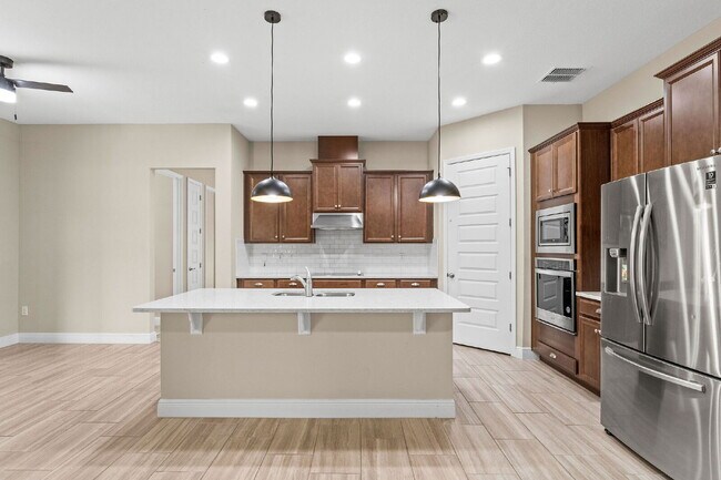 Building Photo - Spacious 4-Bedroom Home with 3 Full Baths ...