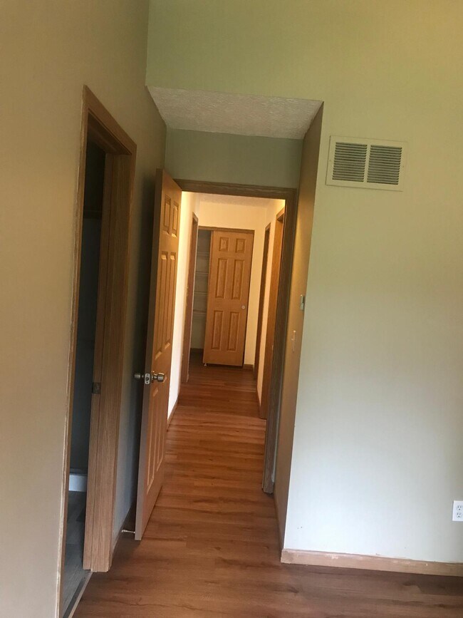 View from master bdrm to hallway & linen closet - 8453 Olenbrook Dr