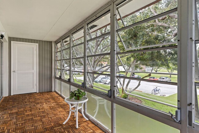 Building Photo - (55+) 2/2 Fully Renovated Furnished Condo ...