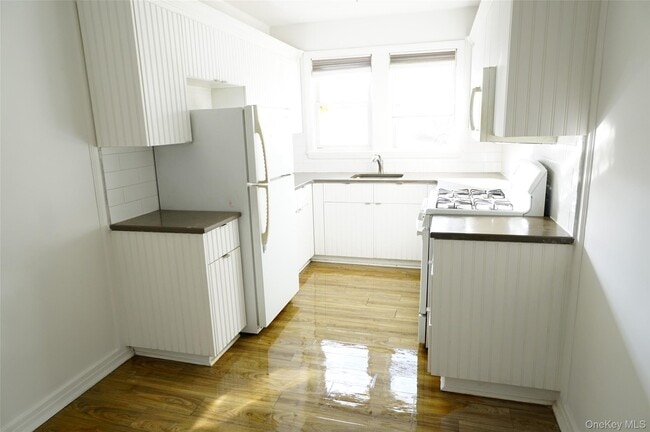 Building Photo - 64-12 48th Ave