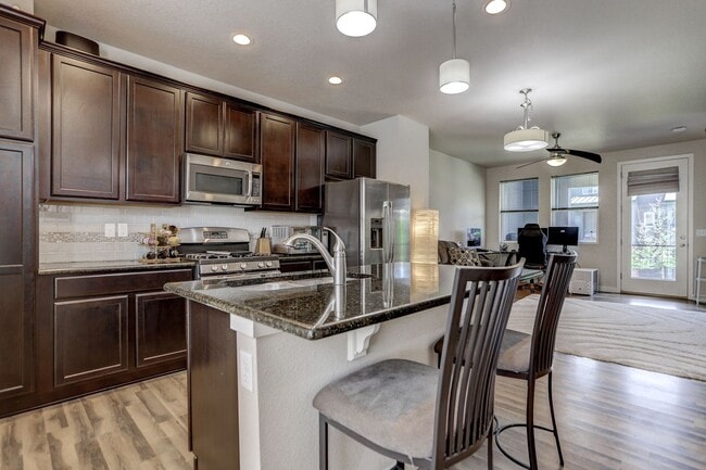 Building Photo - Two Bedroom, Two and a half bath! With Garage, Courtyard View, Stainless Appliances, Great Locati...