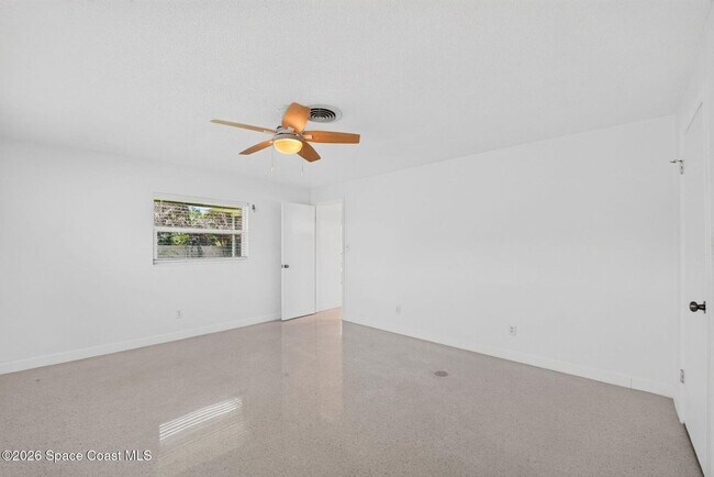 Building Photo - Welcome to this beautifully remodeled 4-bedroom, 3-bath home in the heart of Indialantic Beach!