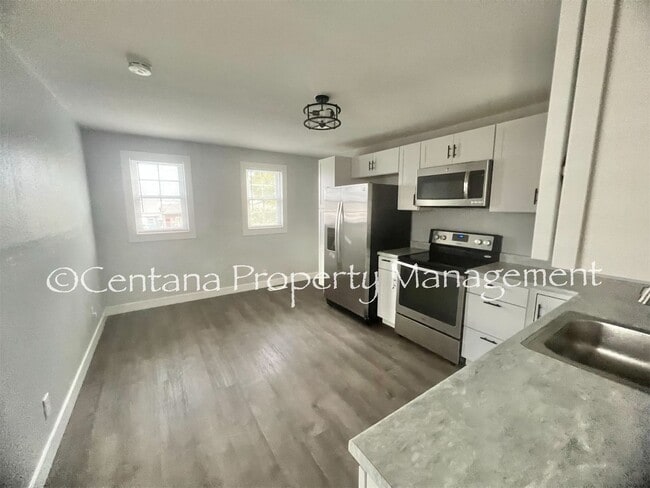 Building Photo - This remodeled two bedroom has all new everything including high end stainless steel appliances.