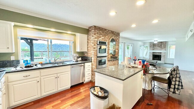 Building Photo - Spacious Two-Story Home with Three-Car Att...