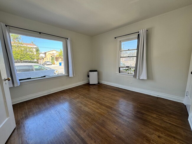 Building Photo - Two Bedroom Front House near Westside Village