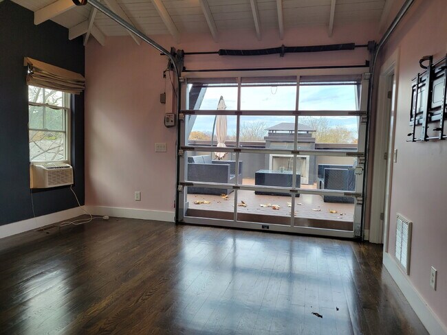 Building Photo - Luxury 12 South Brownstone with Courtyard | Rooftop Deck with Fireplace & Scenic Views | 2-Car Ga...
