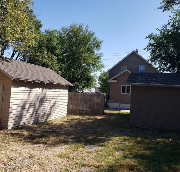 Back Yard with Detached Garage - 709 N Rowley St