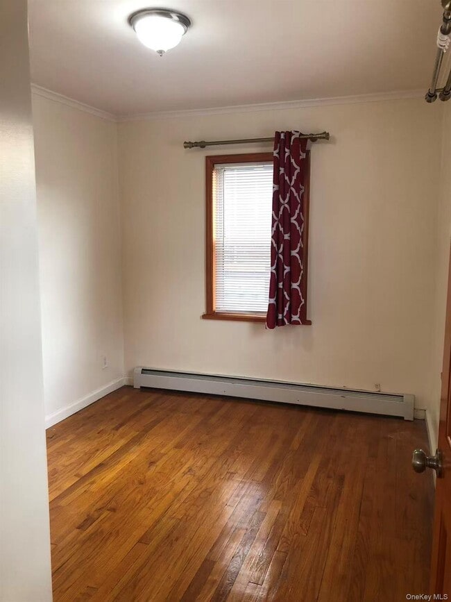 Building Photo - 229-02 Horace Harding Expy