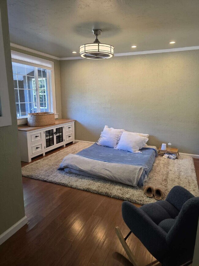 Building Photo - Breathtaking Home offers flexible living with bonus rooms ideal for an office, art studio, gym, o...