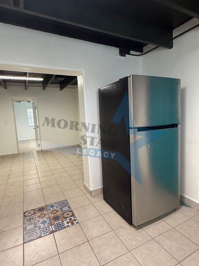 Building Photo - Charming Updated Home w/ Enclosed Yard & Storage