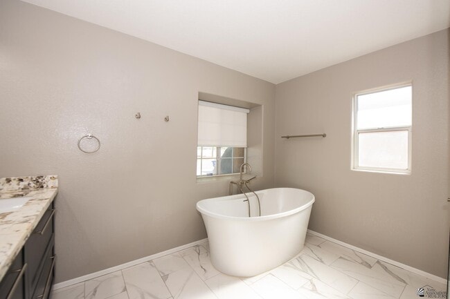 Building Photo - 8215 Forget Me not St