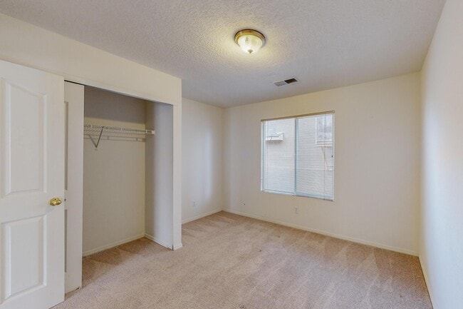 Building Photo - 6056 Malpais Park Ave NW