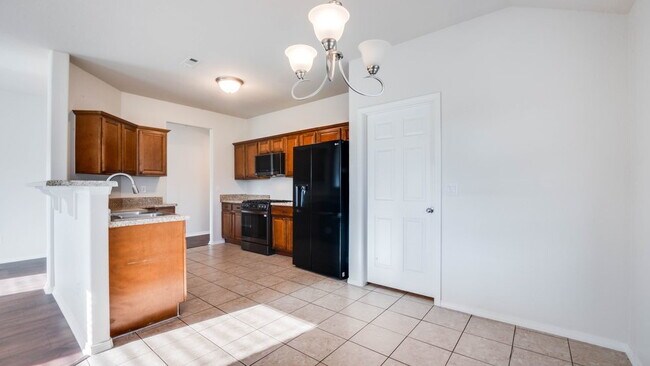 Building Photo - Recently Renovated with EV Charger & Spacious Backyard