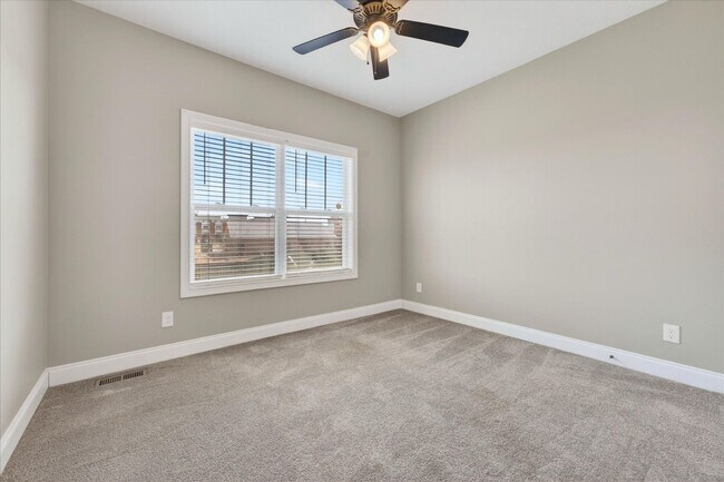 Building Photo - Pet Friendly Four Bedroom with Bonus!