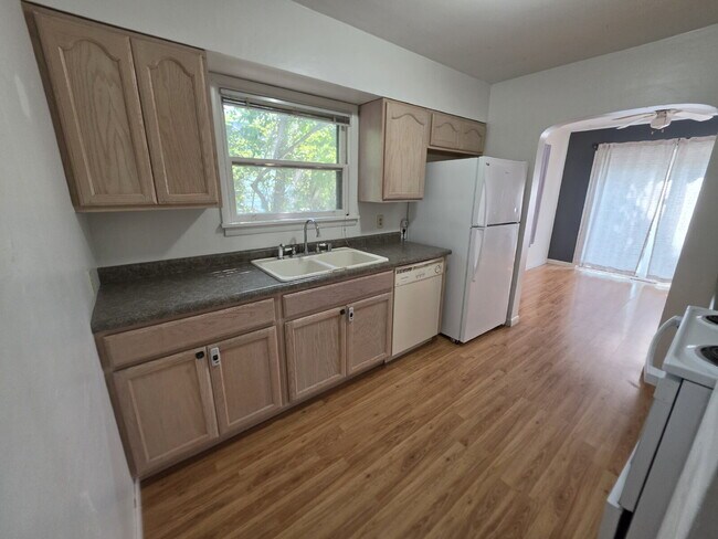 Building Photo - 2 Bedroom, 1 Bathroom West Hill Home with Fenced Yard, Garage, & Bonus Living Space