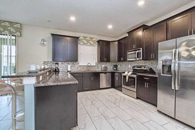 Building Photo - 9160 Scramble Dr