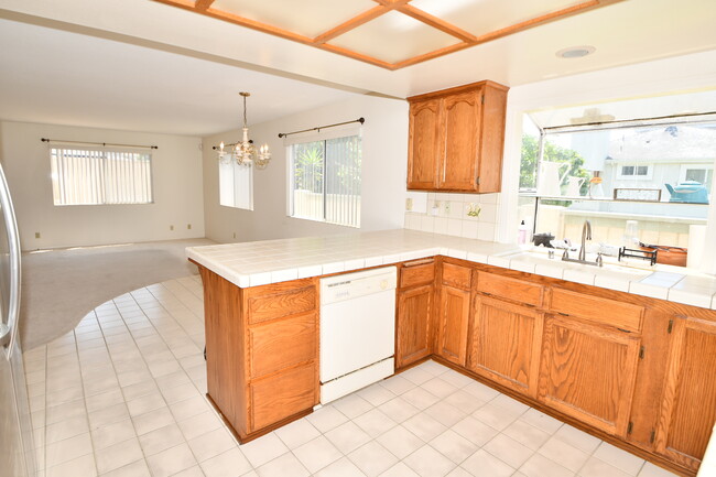 Kitchen opens up to large family room to entertain in. - 1920 Havemeyer Ln