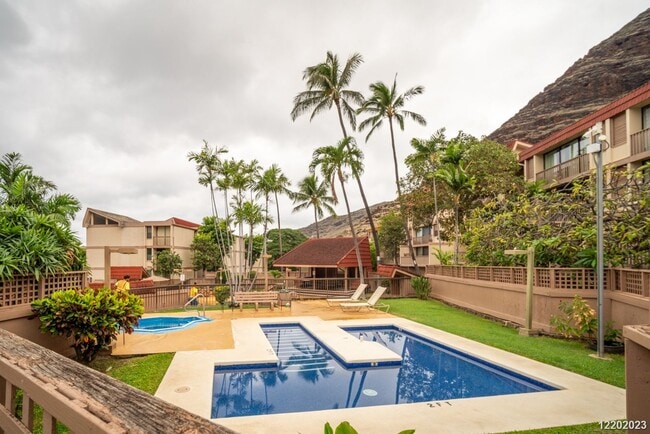 Building Photo - This 2 bedroom, 1 bathroom unit is on the 2nd story in the Makaha Valley Plantation condos. It is...