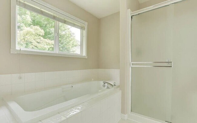 Building Photo - Spacious Four-Bedroom Home with Gourmet Kitchen, Multiple Living Areas, Loft, and Beautifully Lan...