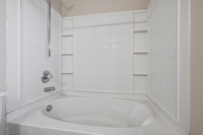 Building Photo - 4BR Home with Open Living Area & Included Appliances