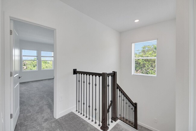 Building Photo - Stunning 4/3 in Gated Dora Parc! Water Views!