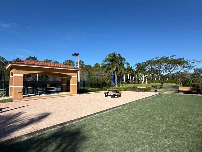 Building Photo - Remodeled, Move-In Ready 3-Bedroom Condo in Prime Naples Location